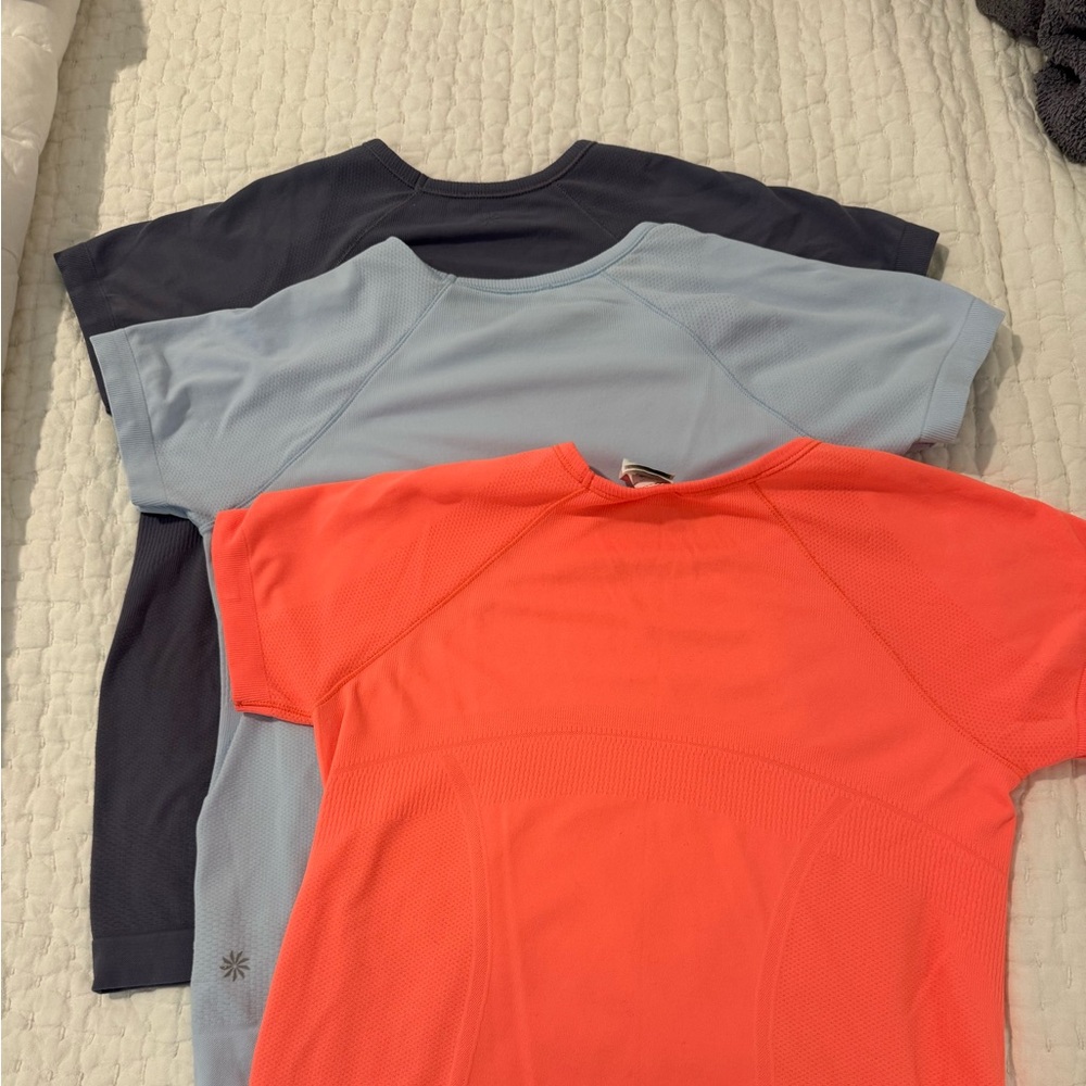 Athleta Girl Power Up Tees. 3 for $70 or $25 each